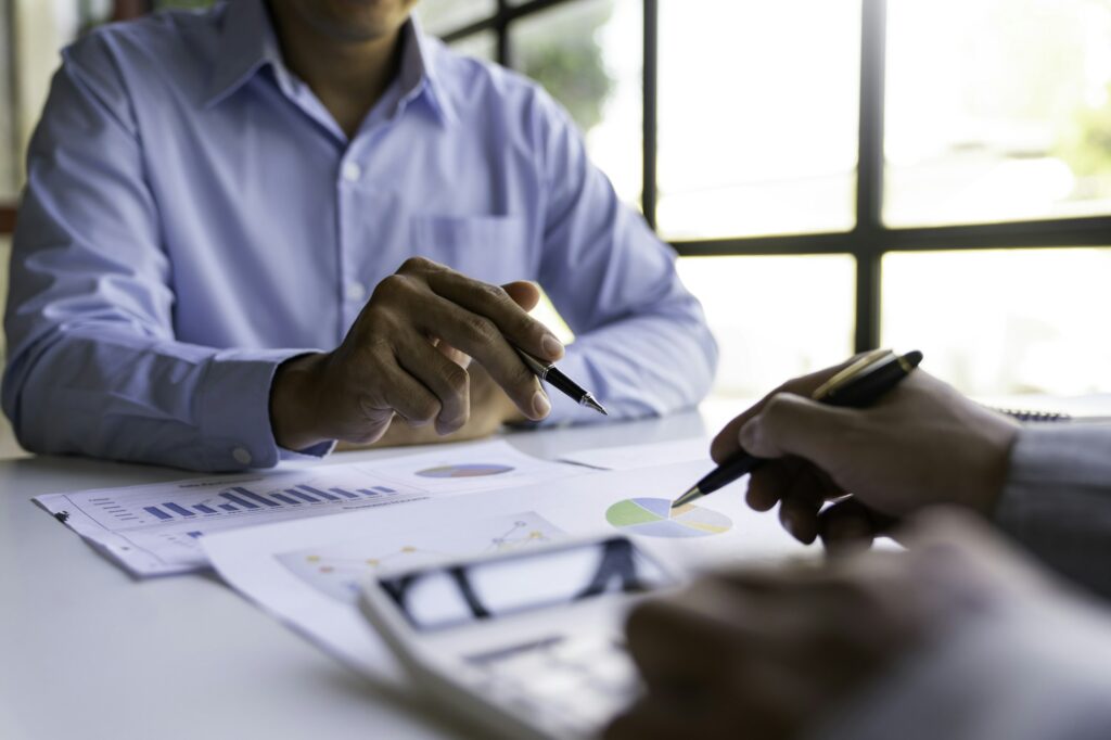 Business People Talking Discussing with concept coworker planning analyzing financial document data